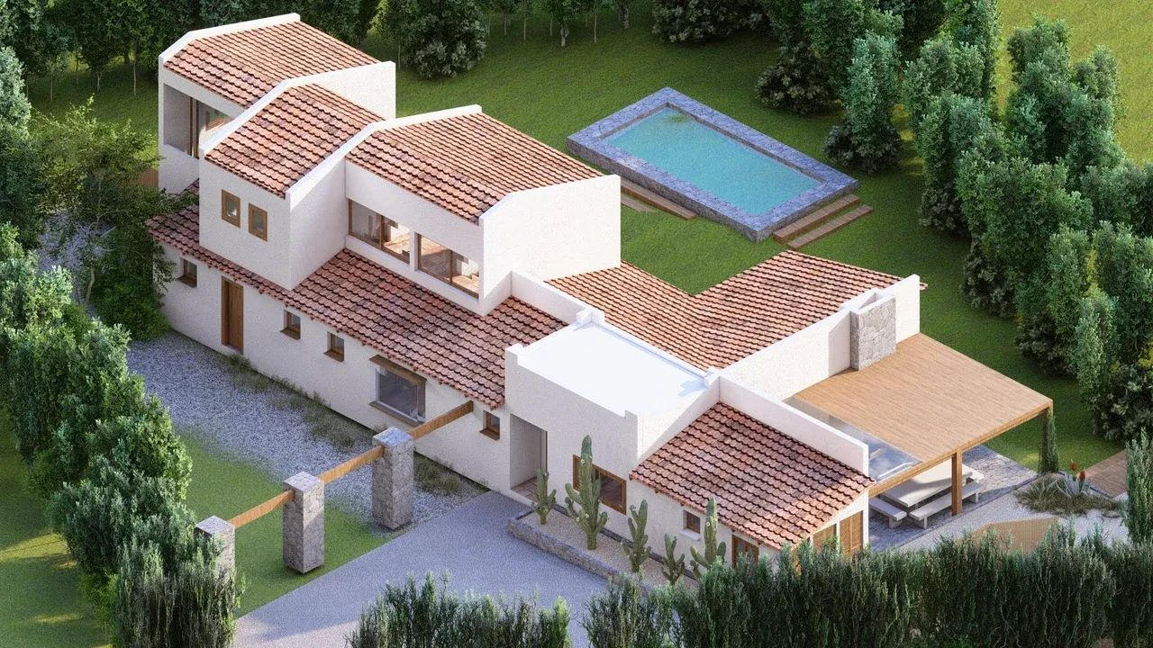 Vista aérea de casa en Marbella con techos de tejas, fachada blanca y grandes ventanales que abren a la terraza de pavimento cerámico