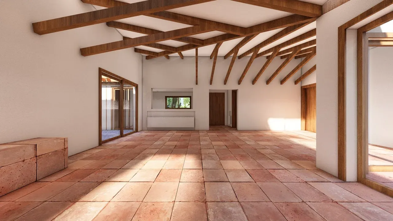 Render 3D de un gran espacio interior en Marbella con fuertes referencias andaluzas. Presenta un piso de baldosas de terracota en tono ladrillo, techos altos con vigas de madera oscura a la vista y paredes blancas lisas. Las aberturas y ventanales son de madera, integrando la estructura expuesta como elemento clave del diseño